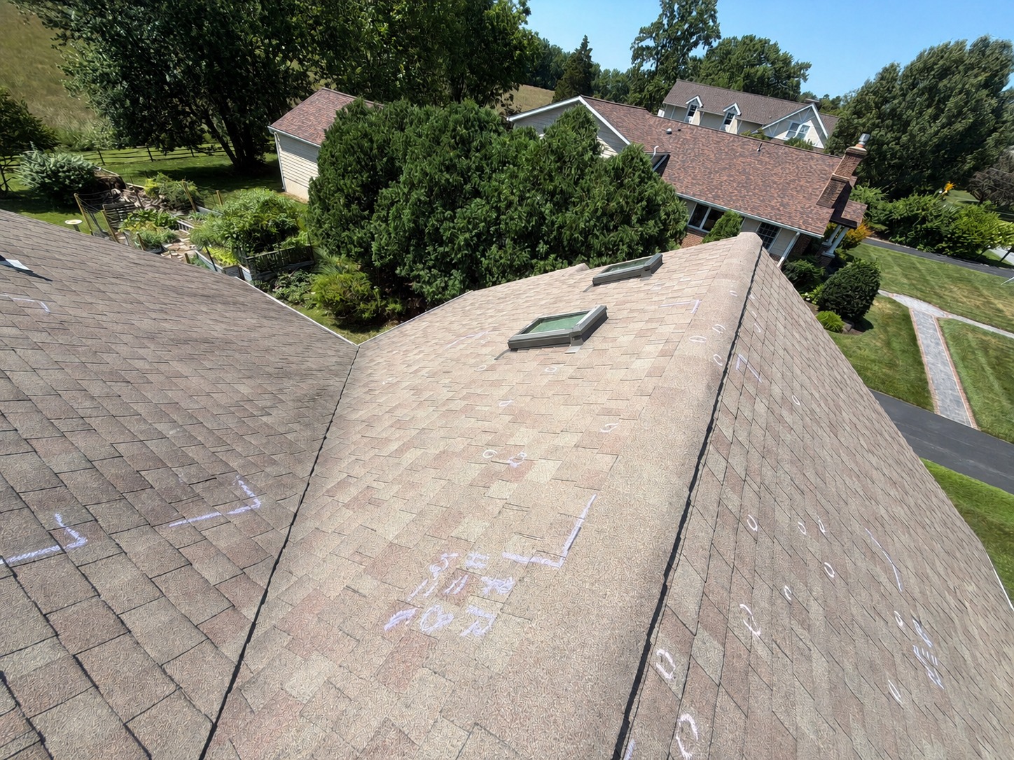 Roof-wide hail inspection with chalk circles and test squares